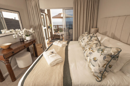 Humpback bedroom with access to patio